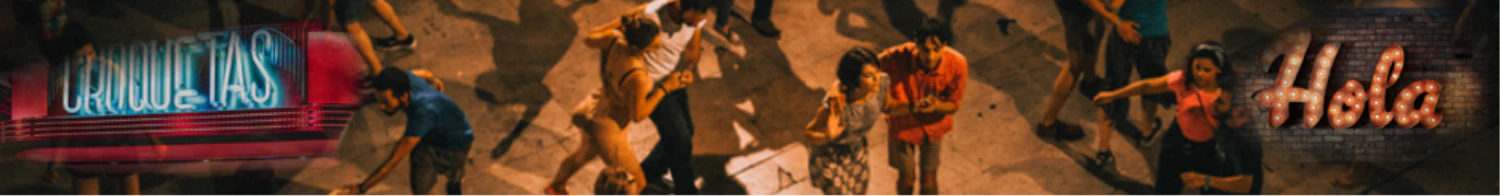 men and women dancing with neon signs around them